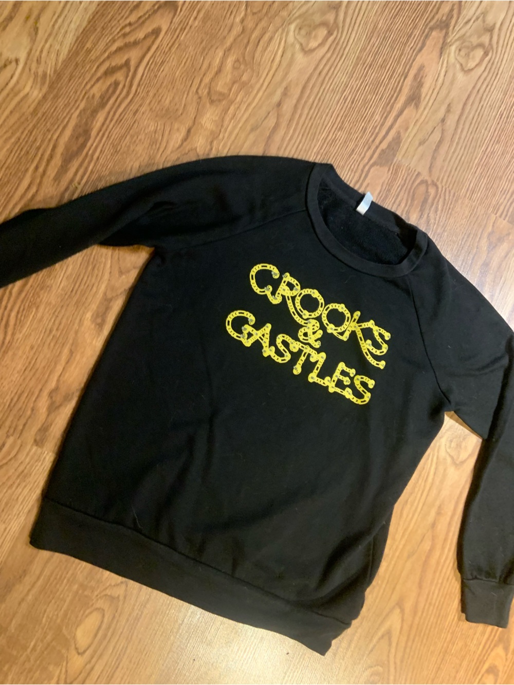 Black Sweatshirt with Yellow 'Crooks & Castles' Graphic